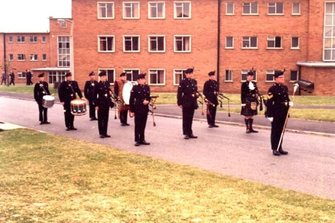 One of the first appearances of the Pipes and Drums